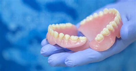 upper dentures cost